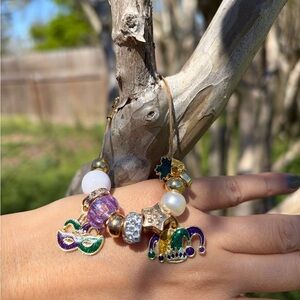 Gold-Tone Mardi Gras Charm Bracelet with Purple and Green Accents